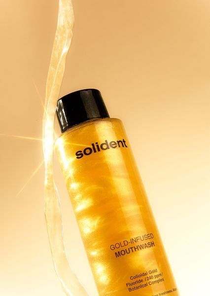 Ополаскиватель для полости рта Solident Gold-Infused Mouthwash с коллоидным золотом, 400 мл 7827 фото